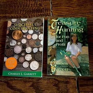 2 paperback books for metal detecting for fun and profit.
